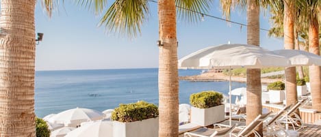 Private beach, sun loungers, beach umbrellas, beach towels