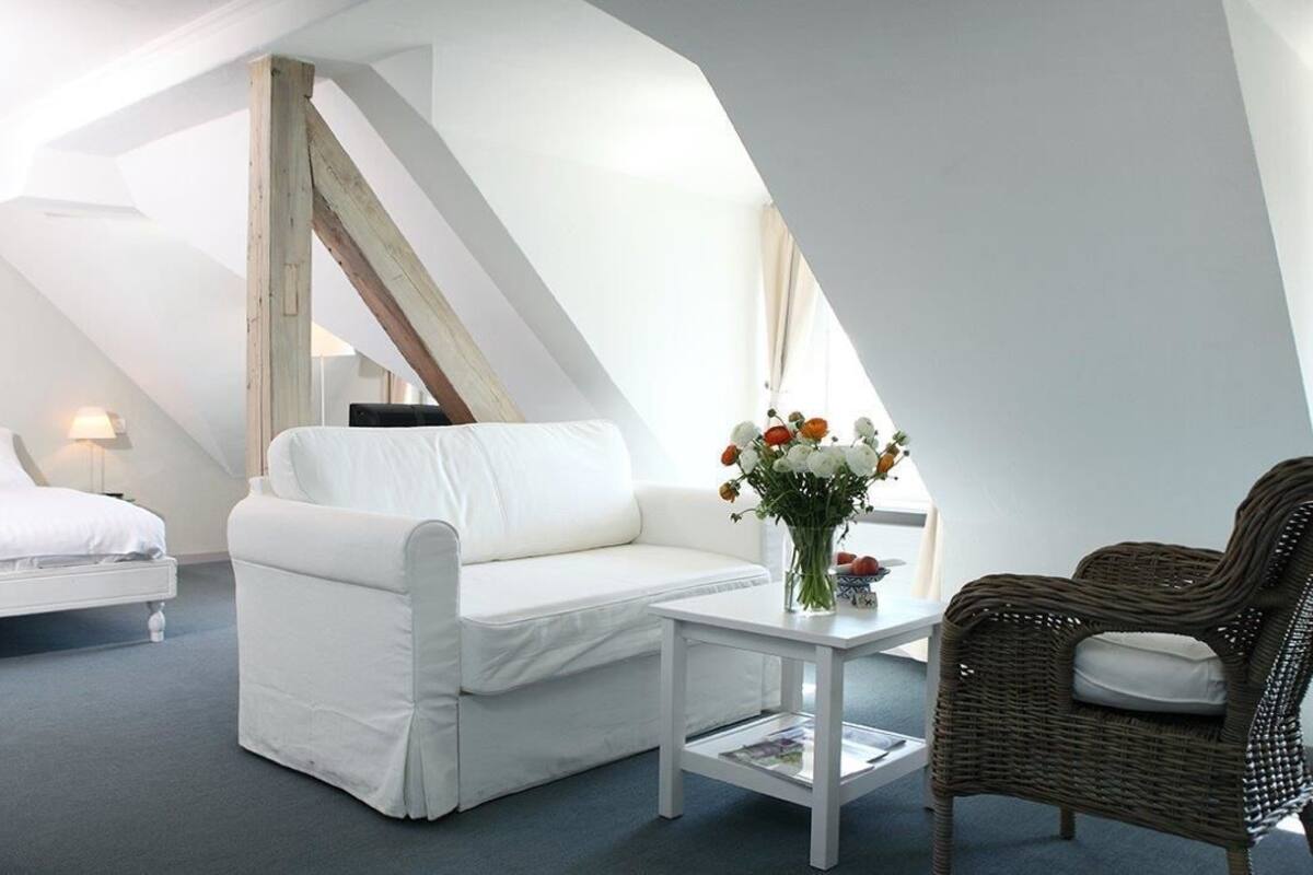 junior suite, 1 king bed | in-room safe, iron/ironing board, free cots/infant beds, free wifi