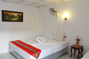 Habitación superior | Caja fuerte, escritorio, camas supletorias y wifi gratis