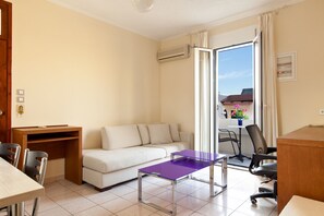 Apartment, 1 Bedroom, Balcony | Living area | 26-inch flat-screen TV with satellite channels, TV - Giorgi's Blue Apartments (Chania)