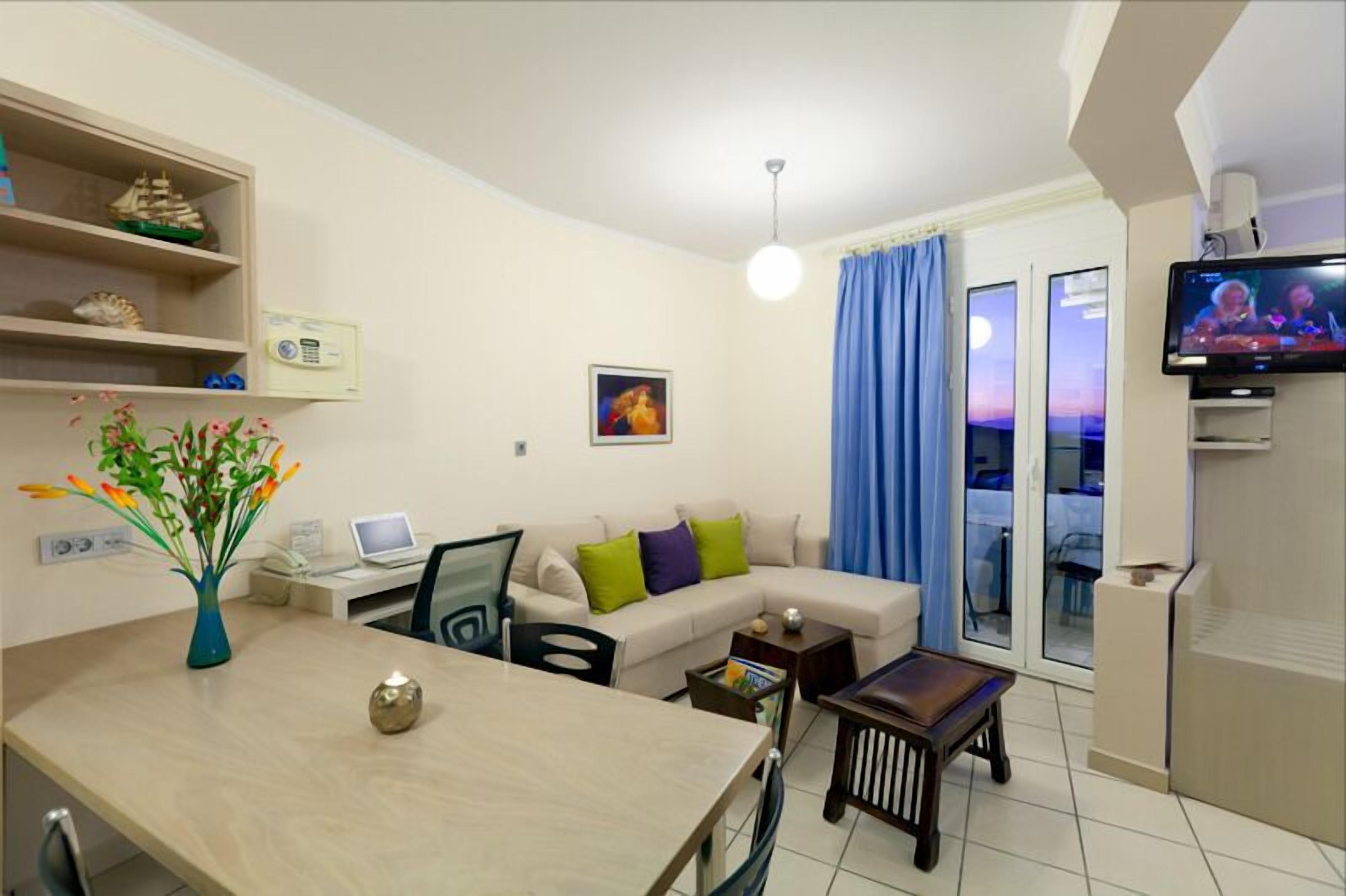 Apartment, 1 Bedroom, Balcony, Sea View | Living area | 26-inch flat-screen TV with satellite channels, TV