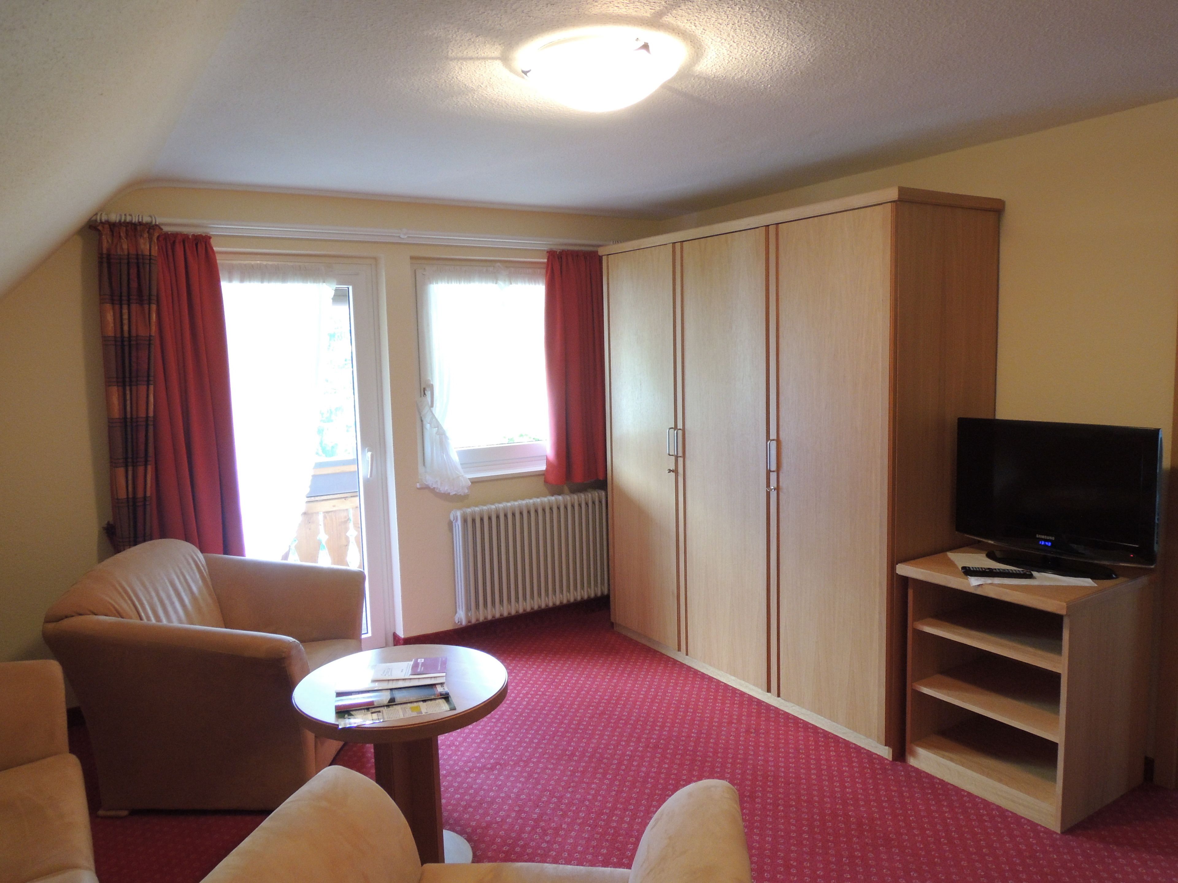 standard suite, 1 bedroom, non smoking, balcony | living area | 40-inch flat-screen tv with satellite channels, tv