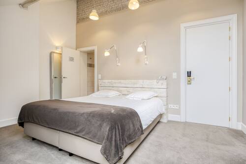 Chambre supérieure | Literie de qualité, coffre-fort, décor unique, ameublement unique