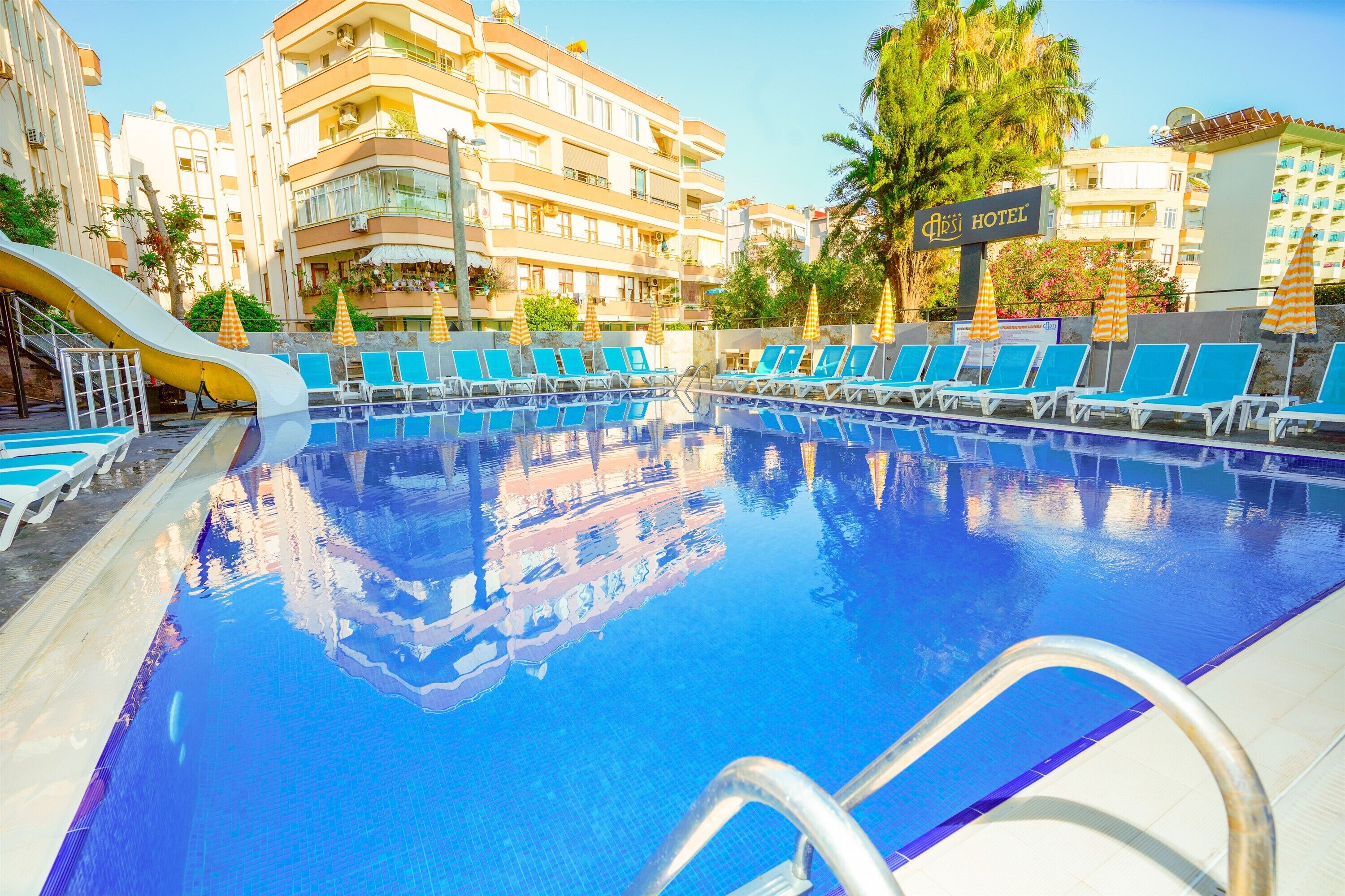 Outdoor pool, free pool cabanas, pool umbrellas