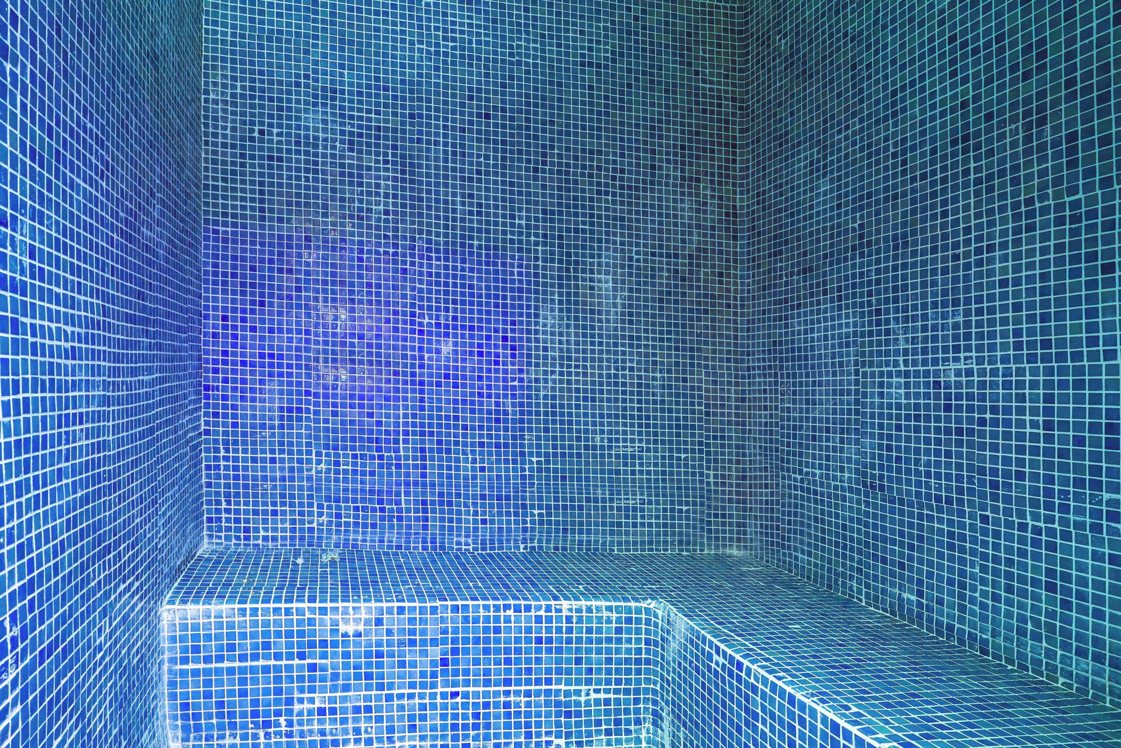A tiled room with a geometric pattern.