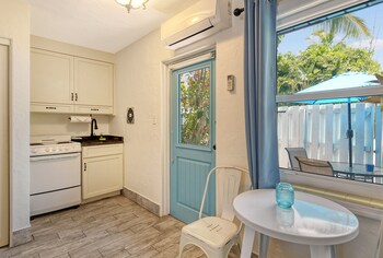 Premium bedding, pillowtop beds, in-room safe, individually decorated at Siesta Key Palms Resort