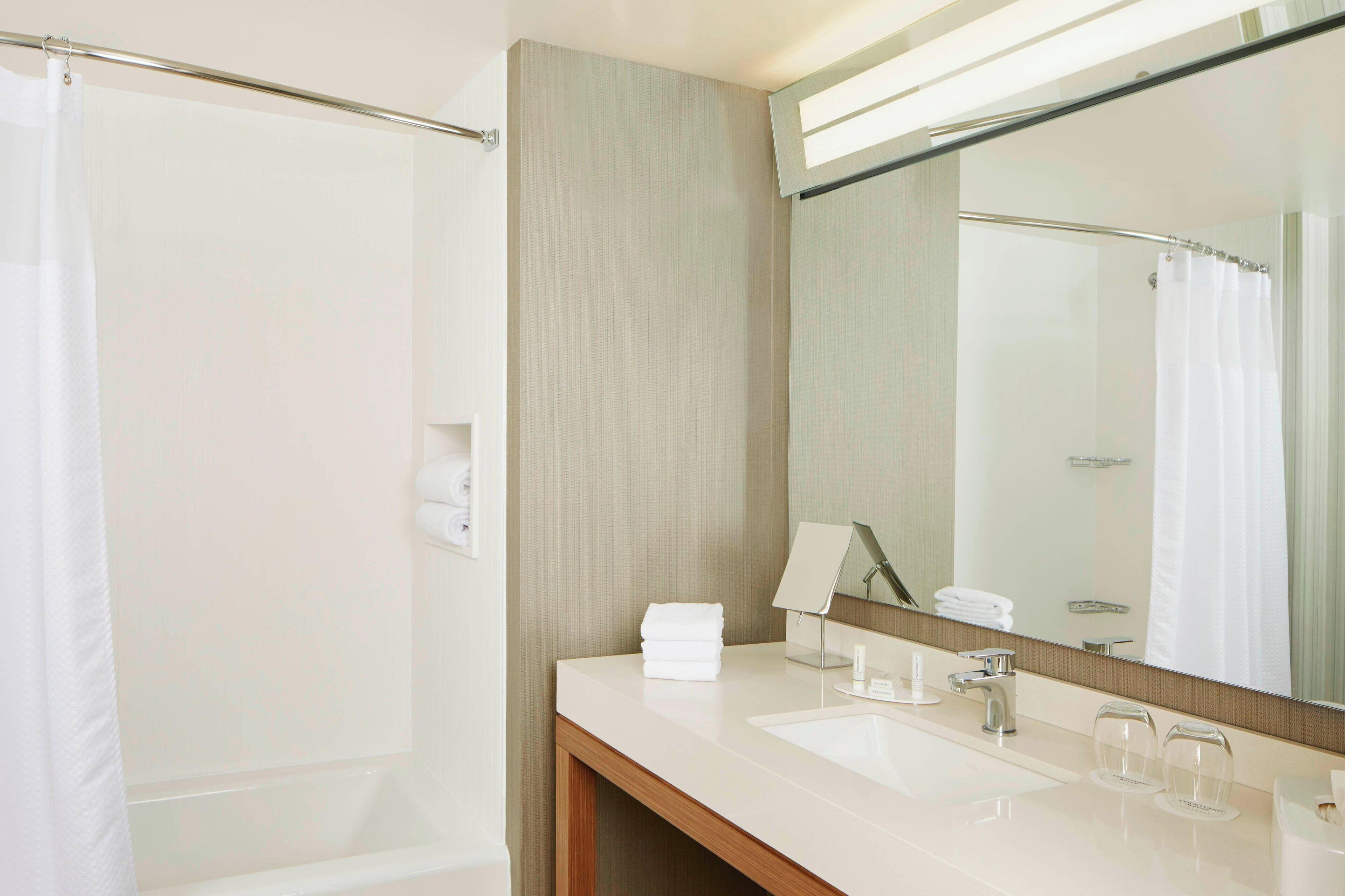 combined shower/bathtub, free toiletries, hair dryer, towels