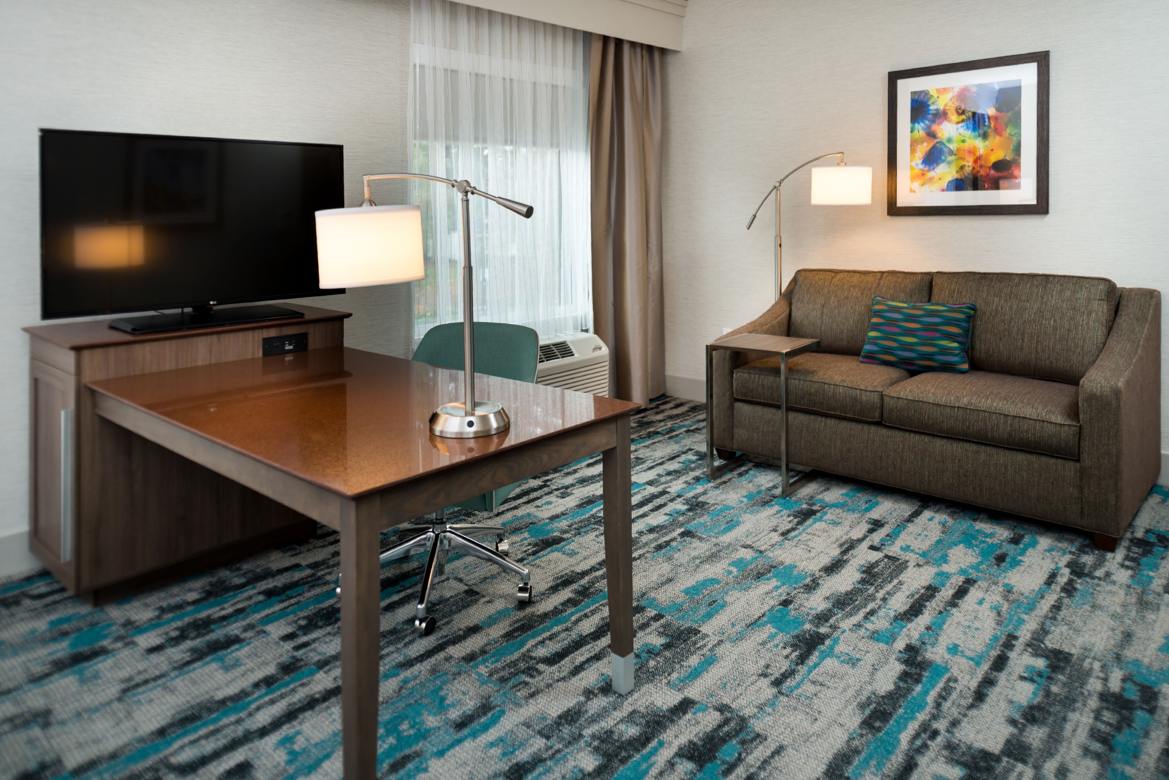 desk, blackout curtains, iron/ironing board, free cots/infant beds