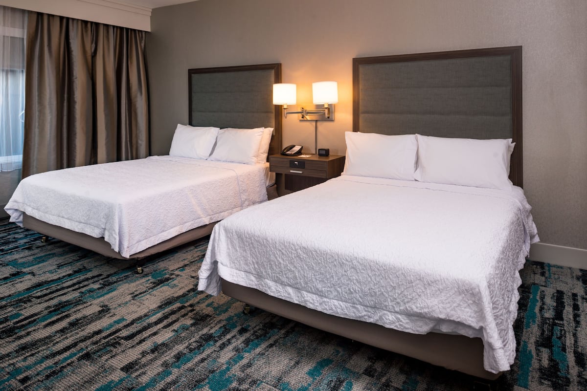 Room, 2 Queen Beds, Accessible, Non Smoking | Desk, blackout drapes, iron/ironing board, free cribs/infant beds