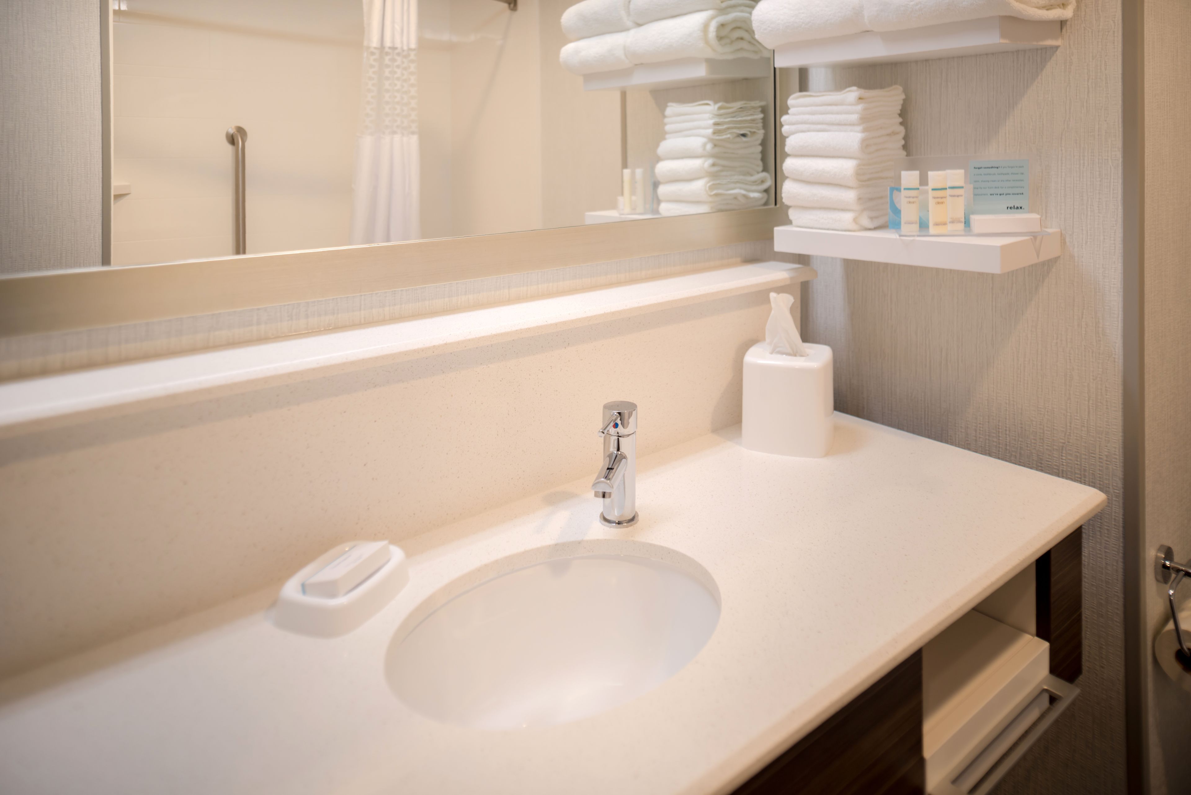 combined shower/bathtub, free toiletries, hair dryer, towels