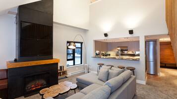 The Penthouse | Living area | 20-inch flat-screen TV with cable channels, TV