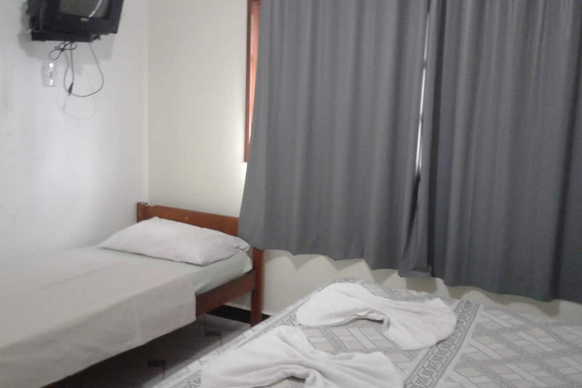 Triple Room | Minibar, blackout curtains, rollaway beds, free WiFi