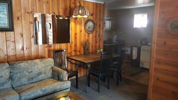 Premium Cabin, 1 Bedroom | Living area | Flat-screen TV, fireplace