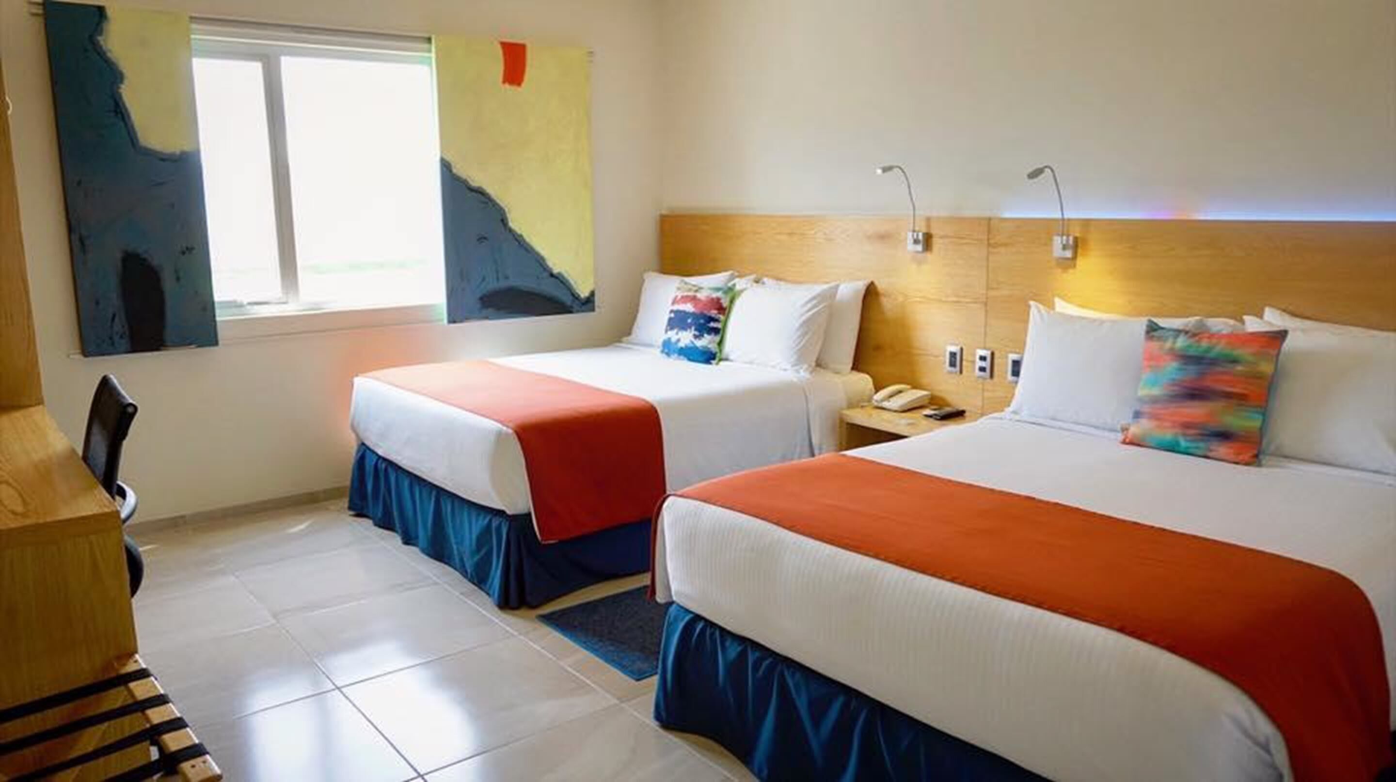 Premium bedding, down comforters, in-room safe, individually decorated