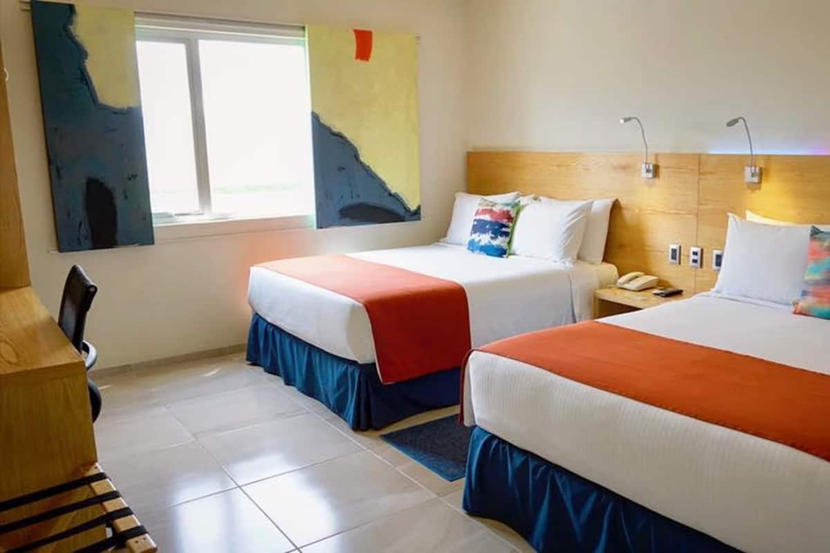 Premium bedding, down comforters, in-room safe, individually decorated