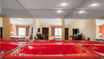 Desk, laptop workspace, iron/ironing board, free cots/infant beds