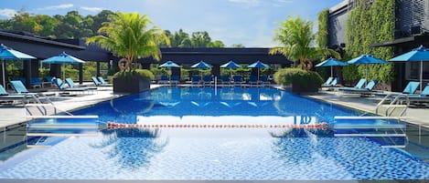 Outdoor pool, open 6:00 AM to 10:00 PM, pool umbrellas