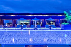 2 outdoor pools, open 6:00 AM to 10:00 PM, pool umbrellas, sun loungers