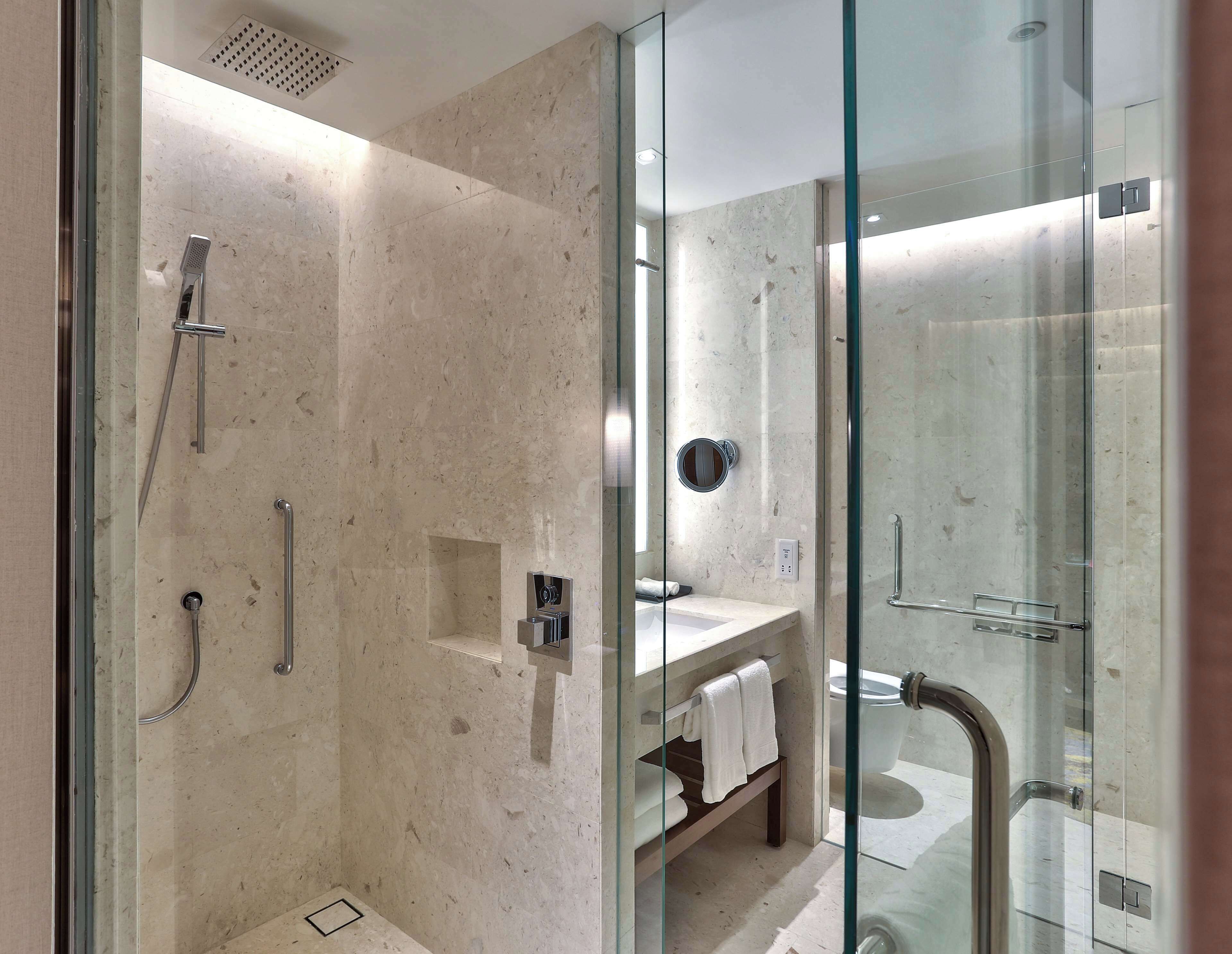 Designer toiletries, hair dryer, bathrobes, bidet