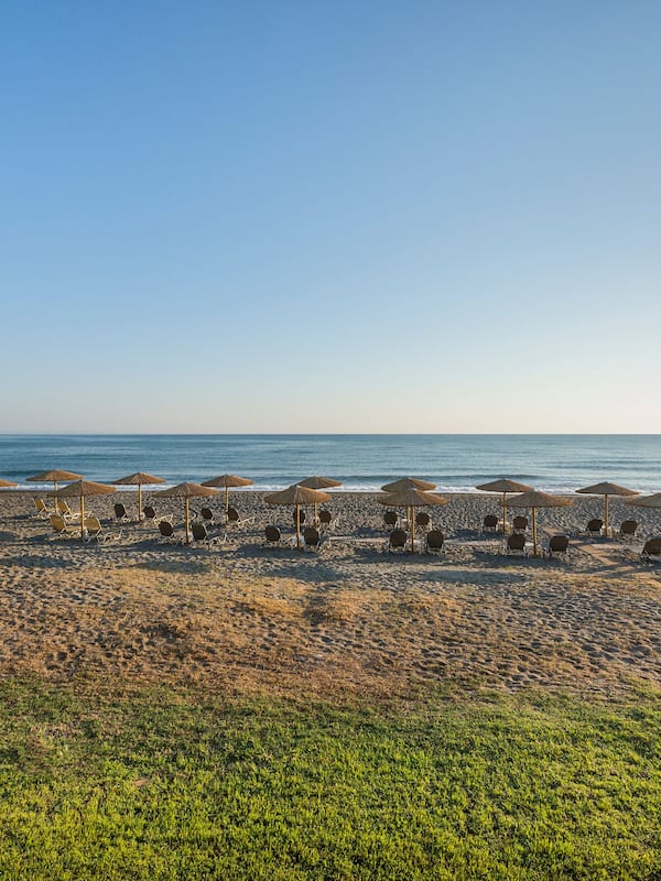 On the beach, sun loungers, beach umbrellas