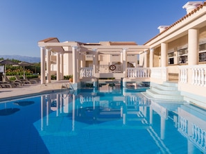 Outdoor pool, pool umbrellas, pool loungers