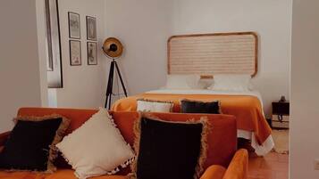 Suíte premium | Edredons de pluma, frigobar, cofres nos quartos, Wi-Fi de cortesia