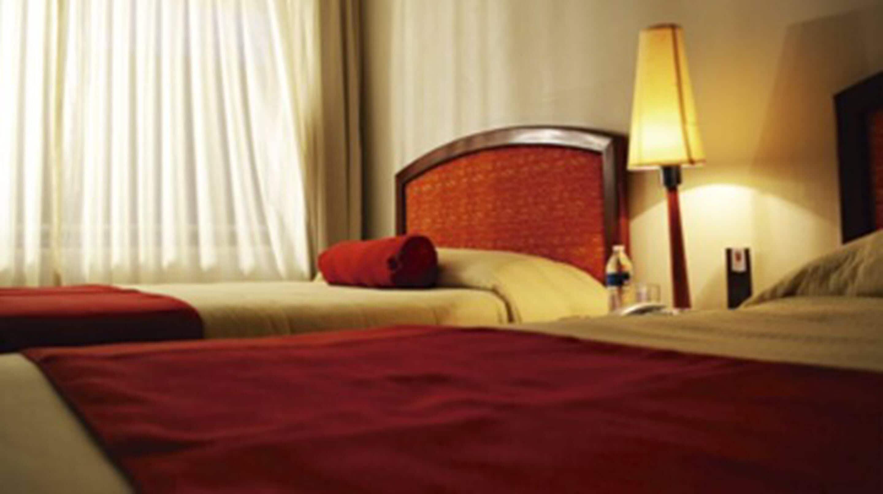 standard room, 2 double beds | in-room safe, iron/ironing board, free wifi, bed sheets