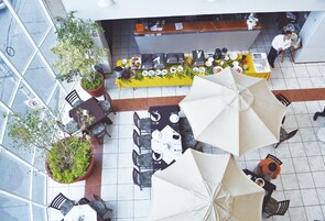 Breakfast, lunch, dinner served; international cuisine