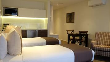 Premium bedding, down duvets, pillow-top beds, desk