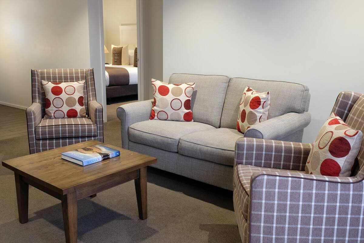 Apartment, 2 Bedrooms | Living area | 55-inch flat-screen TV with satellite channels, TV