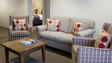 Apartment, 2 Bedrooms | Living area | 55-inch flat-screen TV with satellite channels, TV