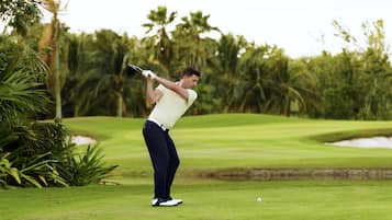 Golfers can enjoy a challenging round on this well-manicured green with a sand bunker.