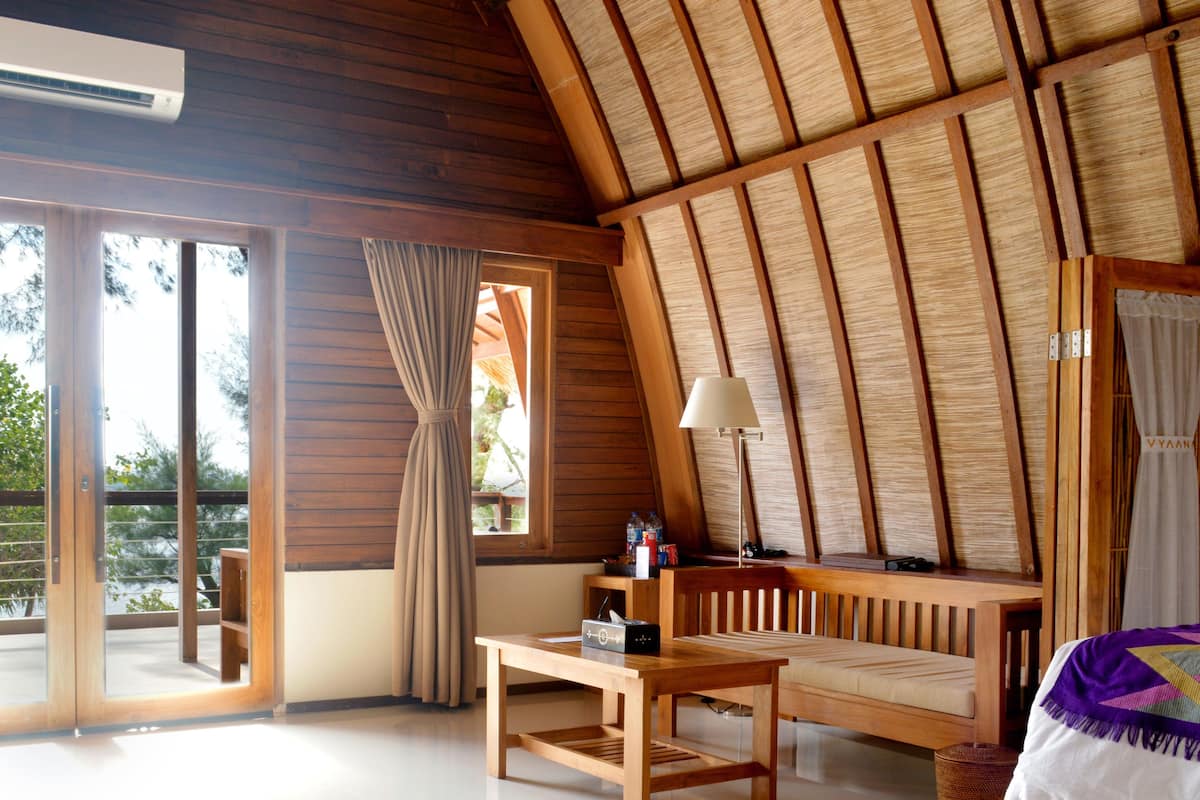 family room, sea view | minibar, in-room safe, desk, blackout curtains