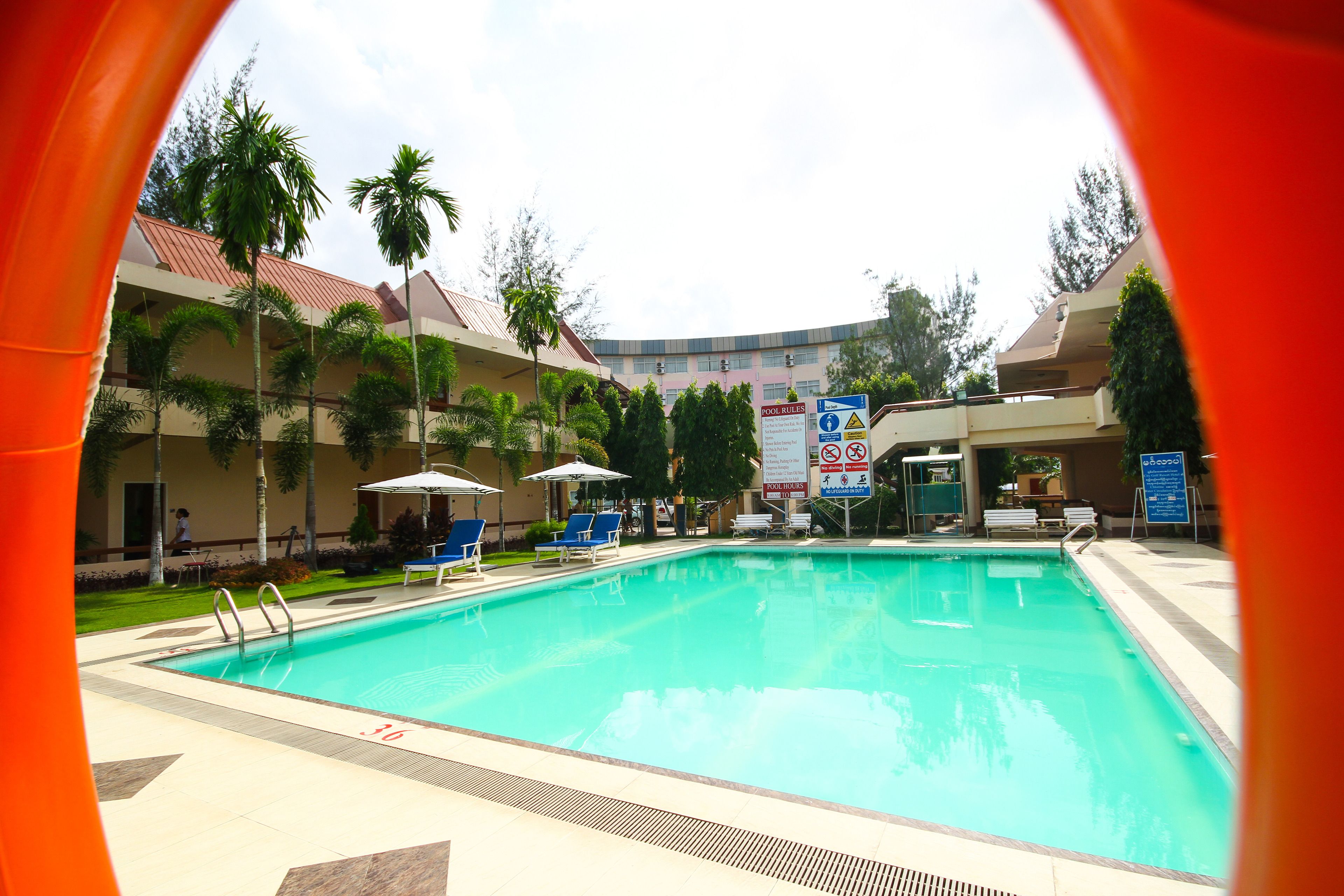 outdoor pool, pool umbrellas, pool loungers