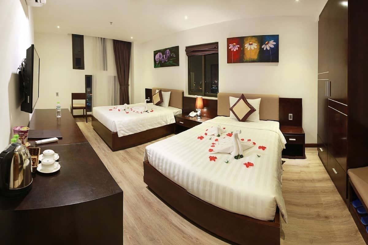 Premium bedding, pillow-top beds, free minibar items, in-room safe