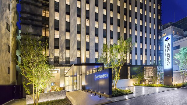 A modern hotel exterior with a prominent sign for 'Hotel Mays' and 'Premier'. - Hotel Mystays Premier Akasaka (Tokyo)