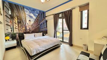 Deluxe Double Room with Balcony | Individually decorated, individually furnished, desk, blackout curtains