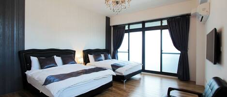 Desk, blackout curtains, soundproofing, rollaway beds