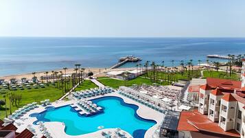 Indoor pool, outdoor pool, pool umbrellas, sun loungers