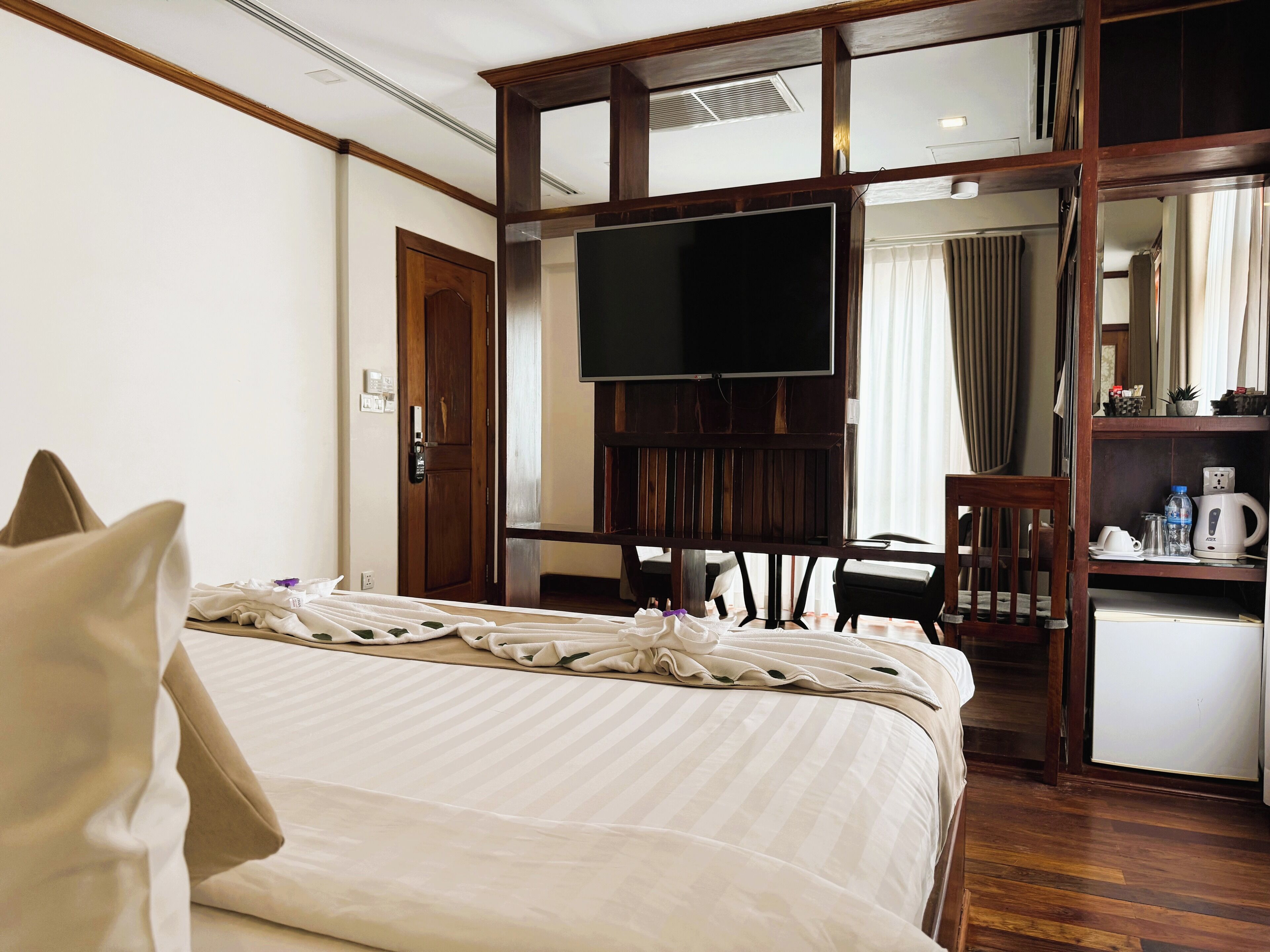 Junior Suite, 1 King Bed, Balcony, City View | 2 bedrooms, premium bedding, minibar, in-room safe