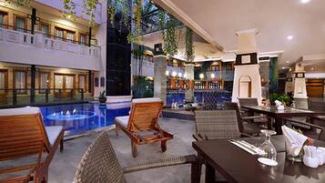 Outdoor pool, pool umbrellas, sun loungers