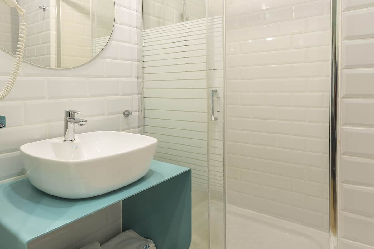 double room, city view | bathroom | shower, free toiletries, hair dryer, slippers