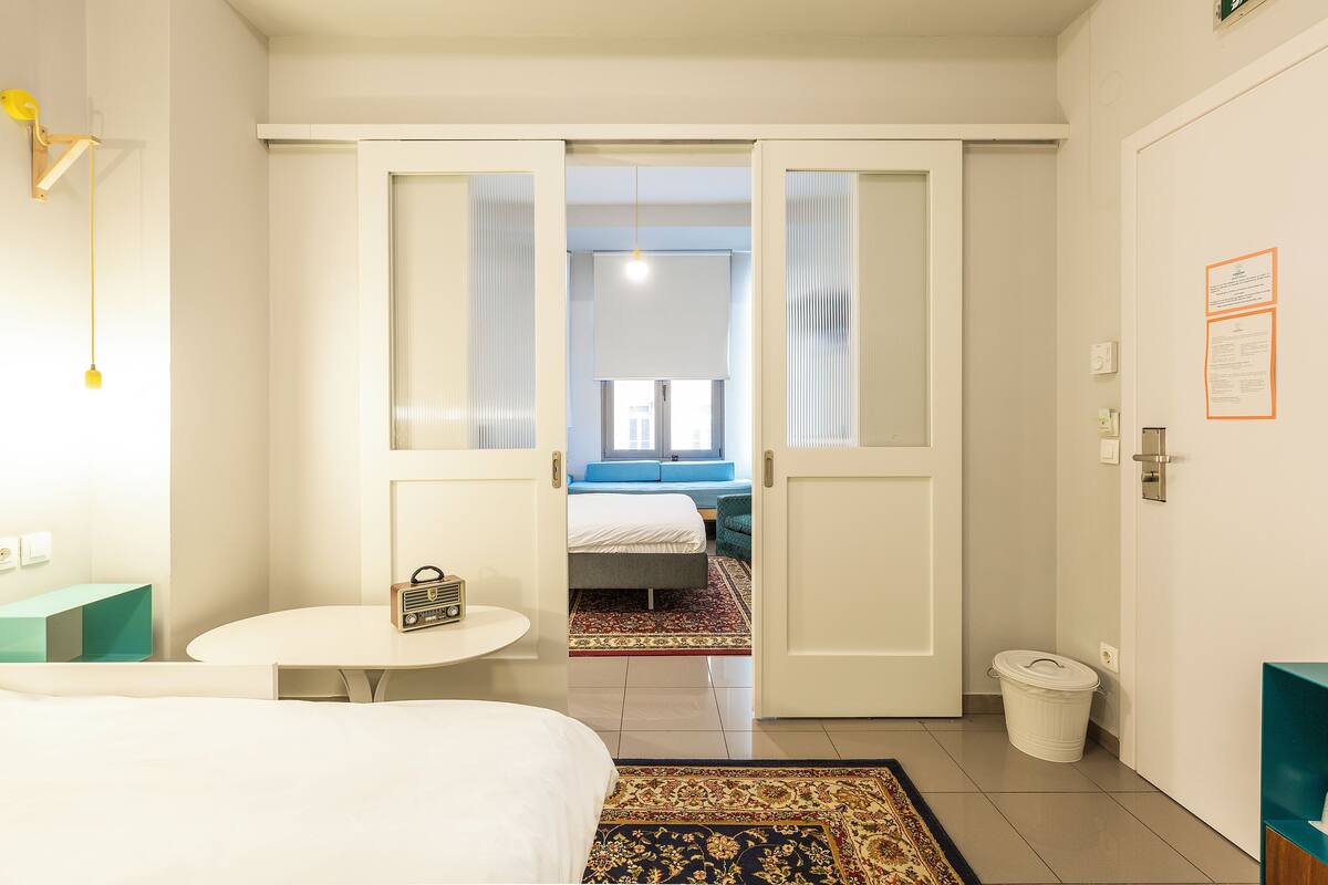 family room | 1 bedroom, premium bedding, minibar, in-room safe