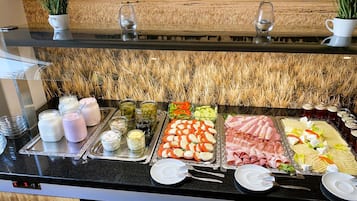 Daily buffet breakfast (EUR 14 per person)