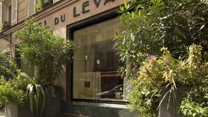 A building facade with the sign "LE VELAN" indicating a hotel or establishment. - Hôtel du Levant (Paris)