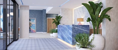 A modern reception area with a marble reception desk, potted plants, and a patterned floor.