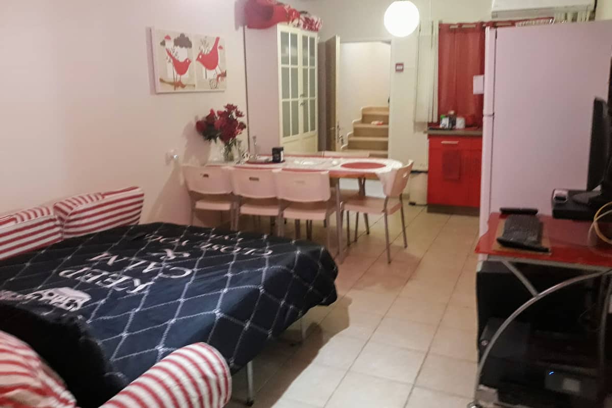 Suite, cocineta, vista a la ciudad (Purple) | Servicio a la habitación