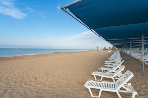 Private beach, sun-loungers, beach umbrellas, beach towels