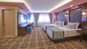 Standard Triple Room | Minibar, desk, cribs (free), WiFi (free)