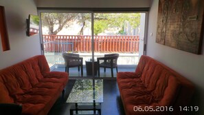 Suite, 1 Bedroom, Balcony | Living area | 32-inch plasma TV with premium channels, TV - Neptune Hotel Apartments (Pegeia)